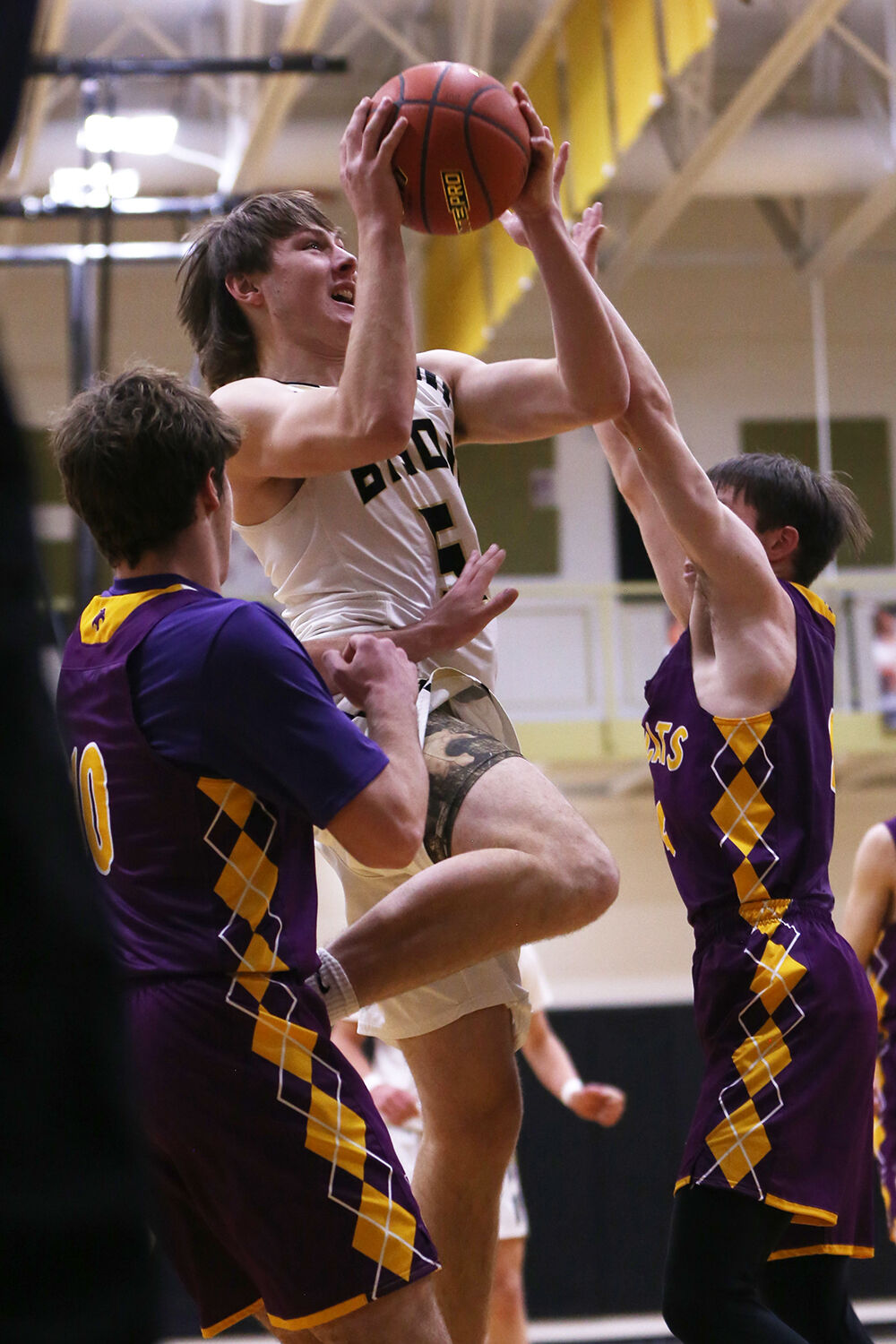 Hunter Stone takes a 2-point shot from under the basket